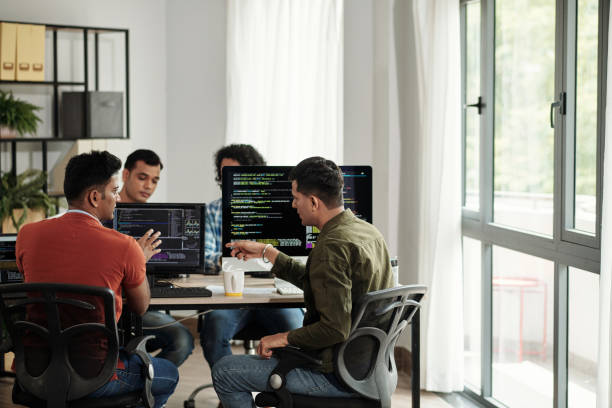 MAGENIC team discussing technology